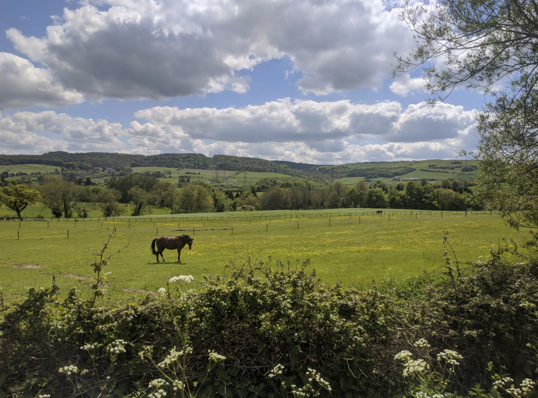 View to the right from Langley Road, in the direction of Belas Knap