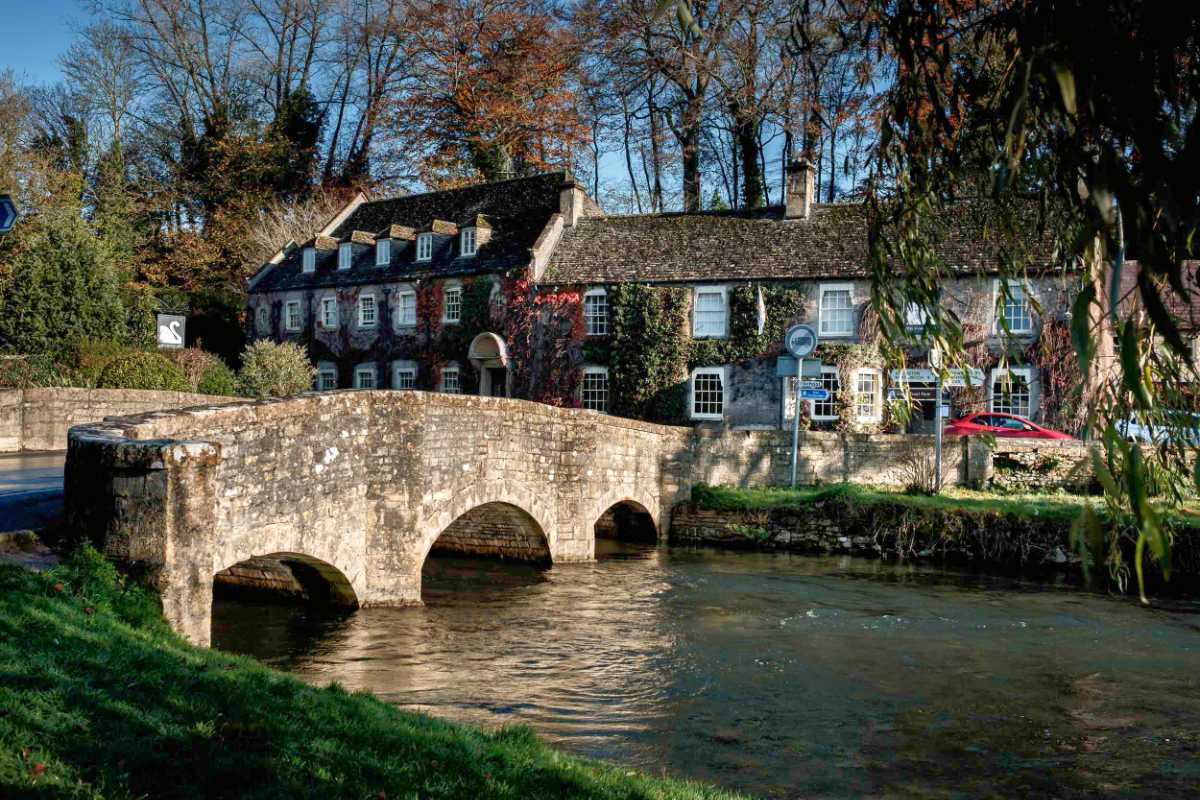 The River Coln passing in front of The Swan Hotel